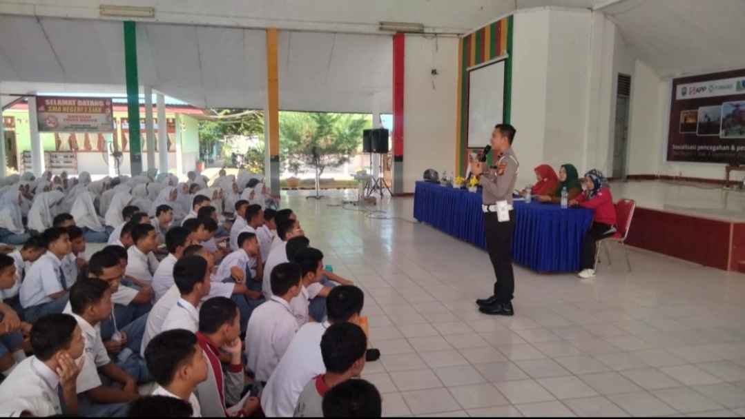 Polres Siak SosialisasikanPenting Nya Keselamatan Berlalulintas Serta Ajak Pelajar Sebagai Pemilih Pemula Ciptakan Pilkada di Kabupaten Siak Aman, Sejuk dan Damai
