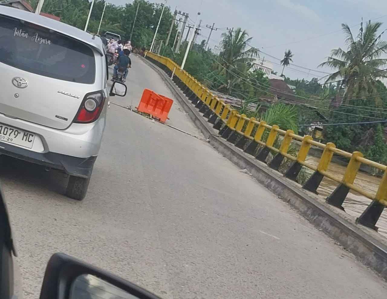 Jembatan sungai rokan ujung batu Nyaris ambruk, Bupati Rohul  Tinjau Kondisi Tiang Penyangga Jembatan 